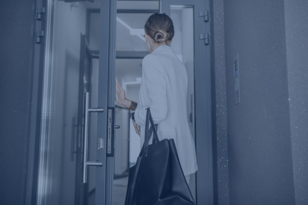 Lady walking through door